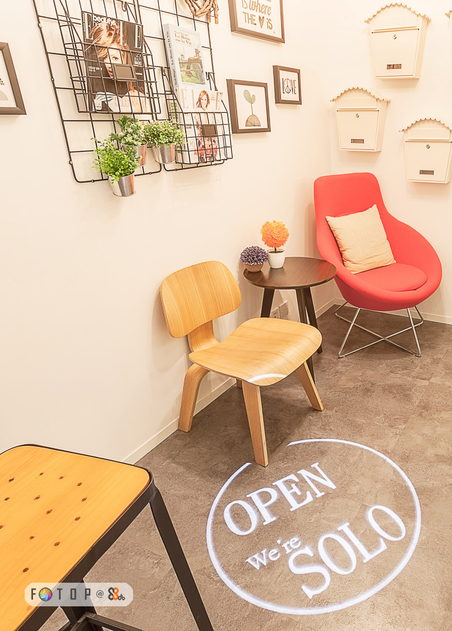 where MIAR OPEN We re SOLO,furniture,chair,yellow,table,floor
